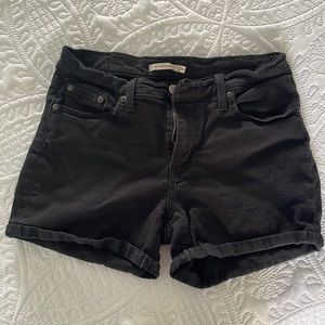 Black Levi Strauss shorts. Mid length. Size 29.